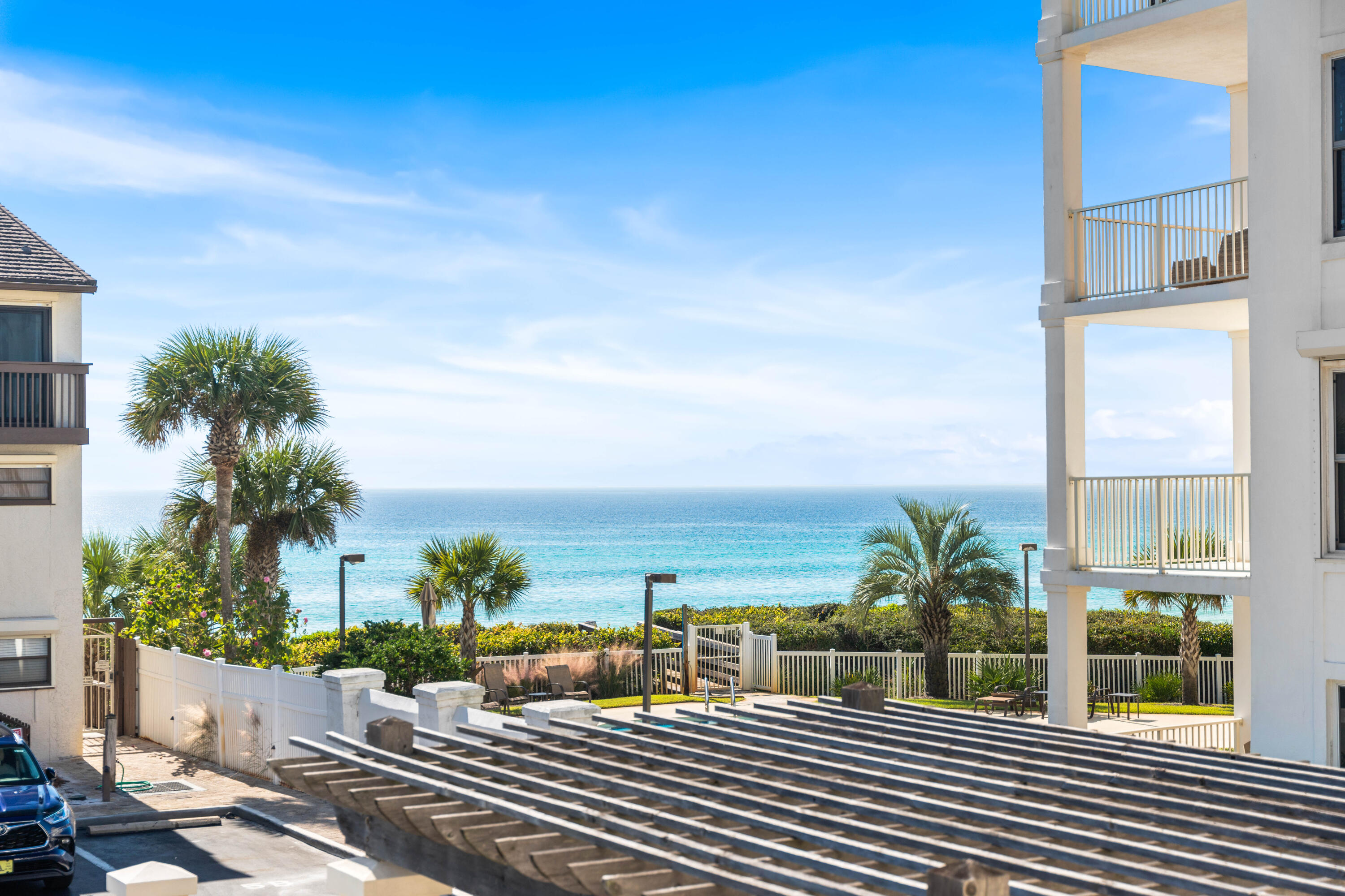3654 East County Highway 30A, Unit 8B Santa Rosa Beach, FL 32459 - Photo 29 of 42 a view of a balcony with chairs