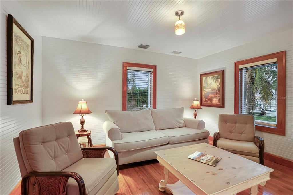 702 Pass A Grille Way St. Pete Beach, FL 33706 - Photo 26 of 41 a living room with furniture and a window