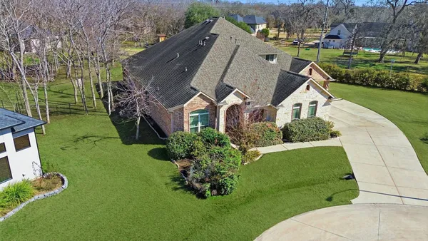 a aerial view of a house with garden
