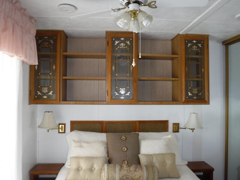84250 Indio Springs Drive, Unit 422 Indio, CA 92203 - Photo 14 of 23 a bathroom with a sink and mirror