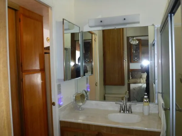 a bathroom with a sink and a mirror