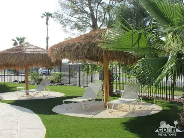 a garden view with a seating space