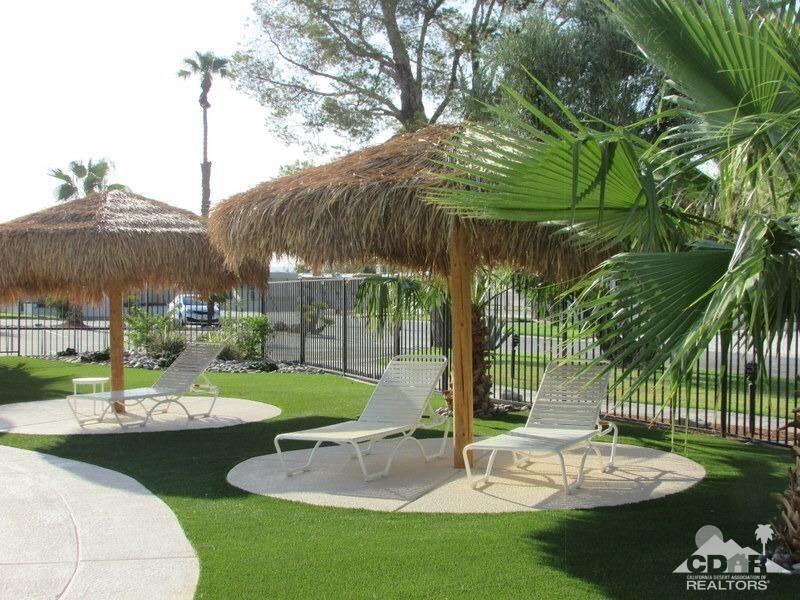 84250 Indio Springs Drive, Unit 422 Indio, CA 92203 - Photo 18 of 23 a garden view with a seating space