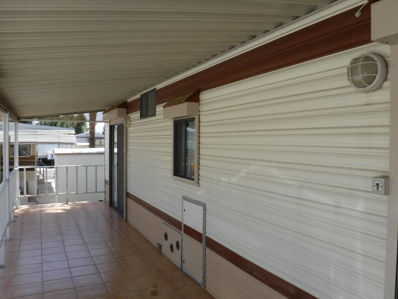 84250 Indio Springs Drive, Unit 422 Indio, CA 92203 - Photo 23 of 23 a bathroom with a bathtub and a shower