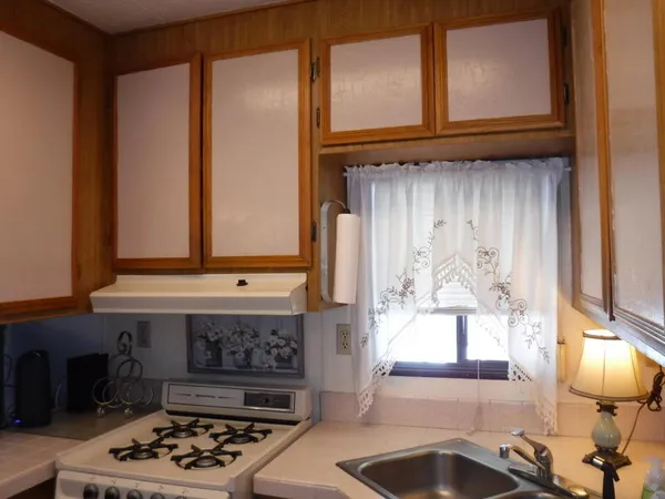 a bathroom with a sink a toilet and a bathtub