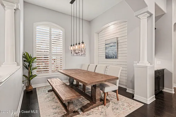 a view of a livingroom with furniture and window