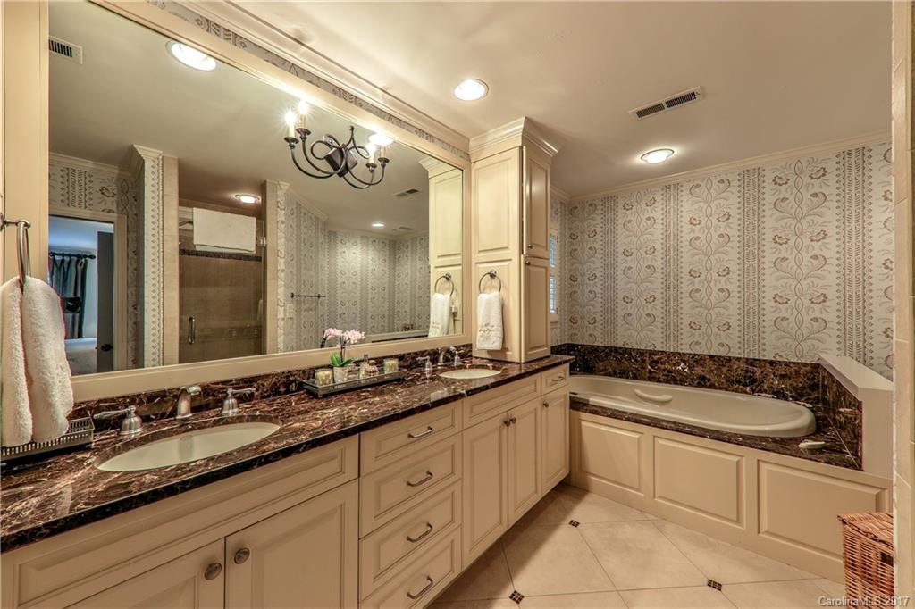 3214 Colony Road Charlotte, NC 28211 - Photo 14 of 24 a spacious bathroom with a sink mirror and a bathtub
