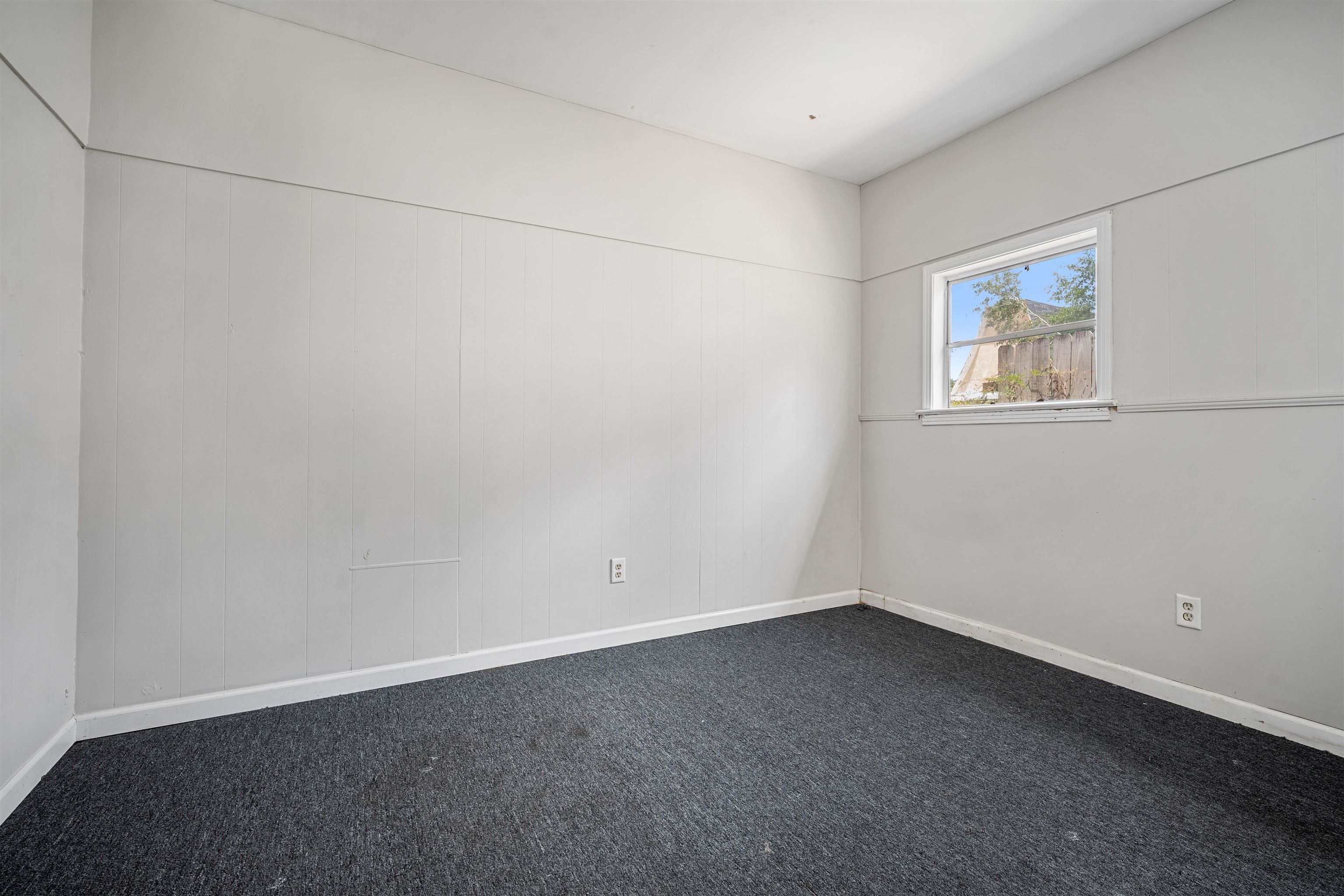 3014 Farcott Street Mobile, AL 36606 - Photo 22 of 26 Unfurnished room with dark carpet and baseboards