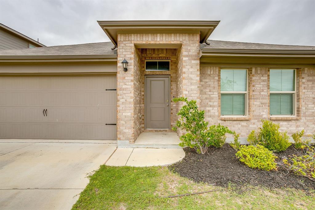2313 Stallings Road Fort Worth, TX 76108 - Photo 2 of 30 a front view of a house with garden
