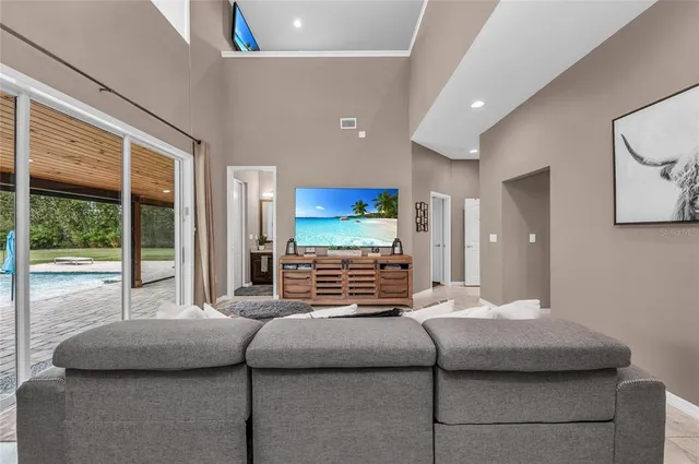 a bathroom with a granite countertop sink a mirror and a shower