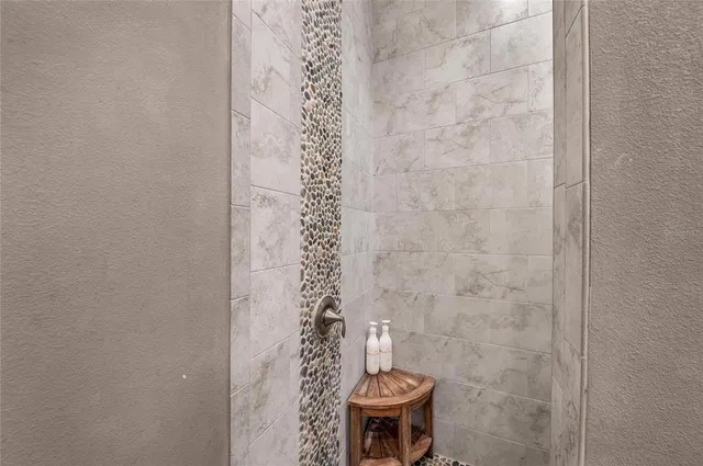 a view of a backyard with a patio and a garden