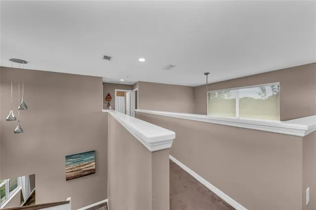 a view of a golf course with a lake