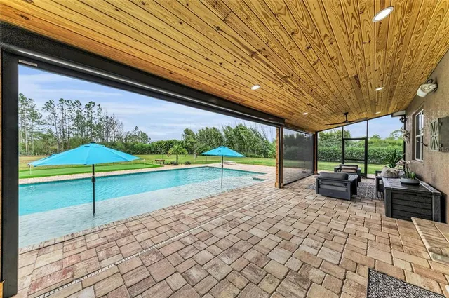 a view of lake with houses in the back