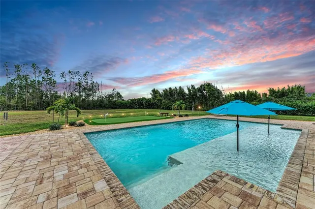 a view of a lake with a yard