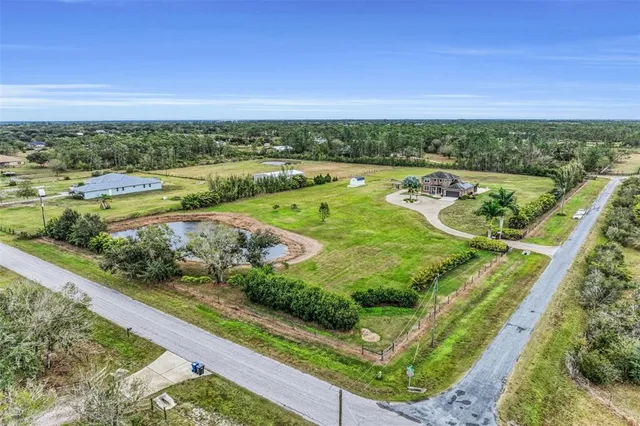 a view of a house with a big yard