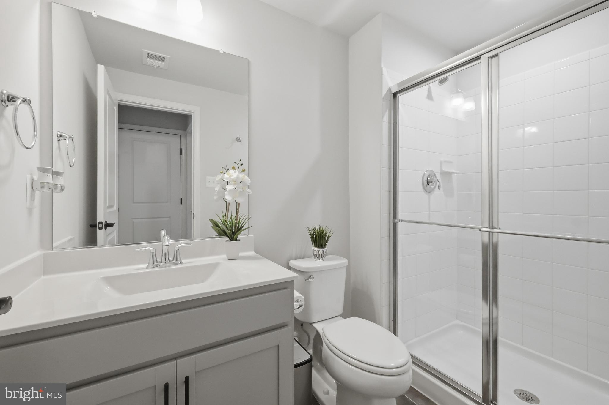 5707 Hawk Ridge Road Frederick, MD 21704 - Photo 59 of 109 a bathroom with a sink toilet and shower