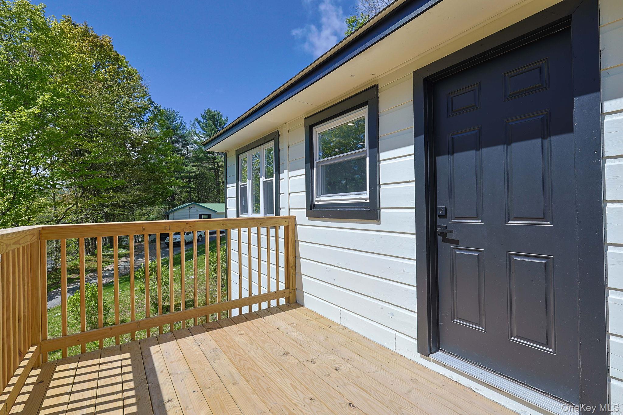 25 Overlook Road Woodbourne, NY 12788 - Photo 4 of 22 a view of a wooden deck