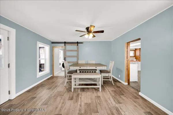 a view of livingroom with furniture wooden floor and window