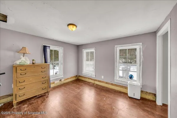 a view of an empty room and window