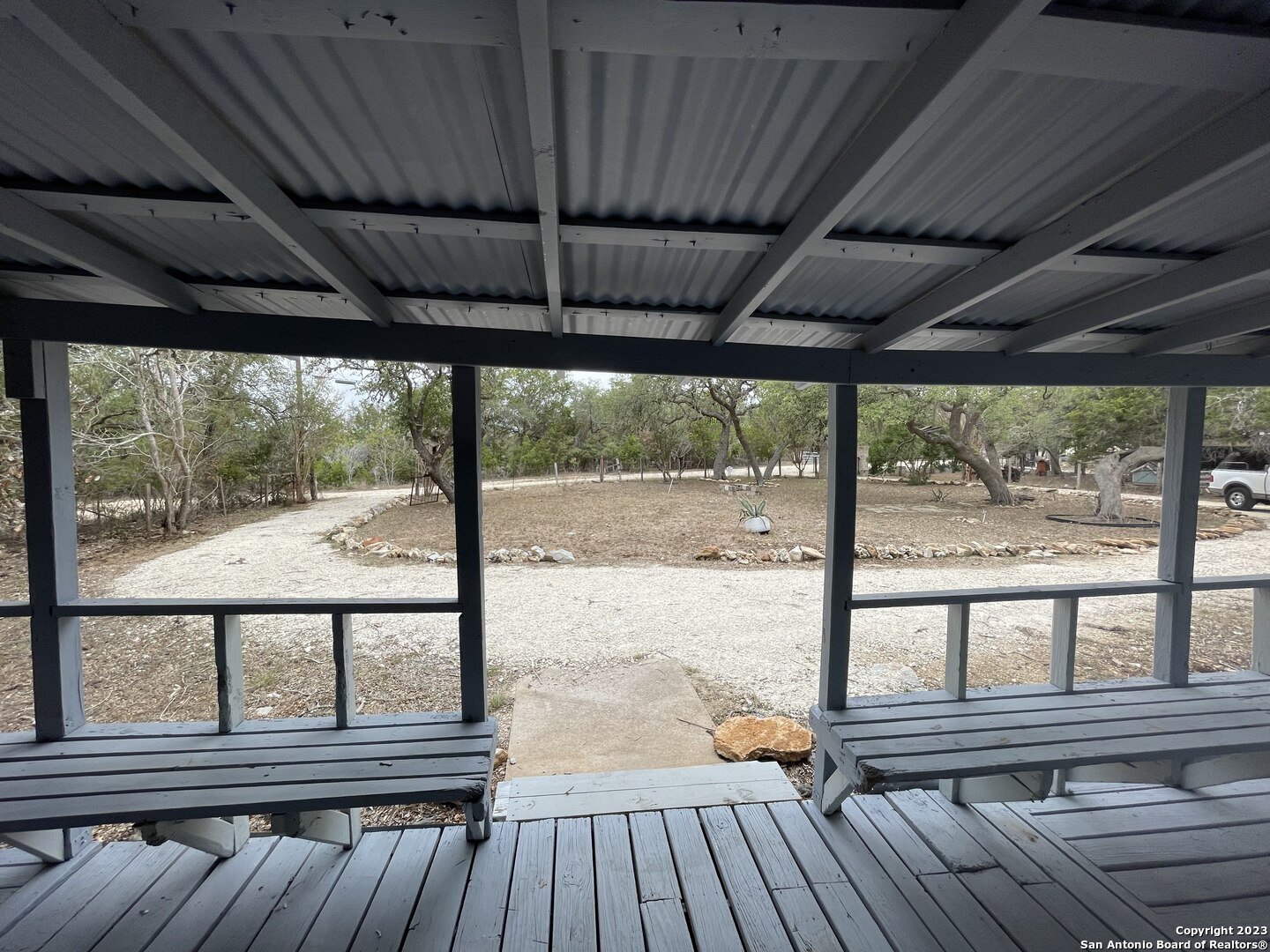 125 Pecan Drive Spring Branch, TX 78070 - Photo 2 of 12 a view of porch with wooden floor