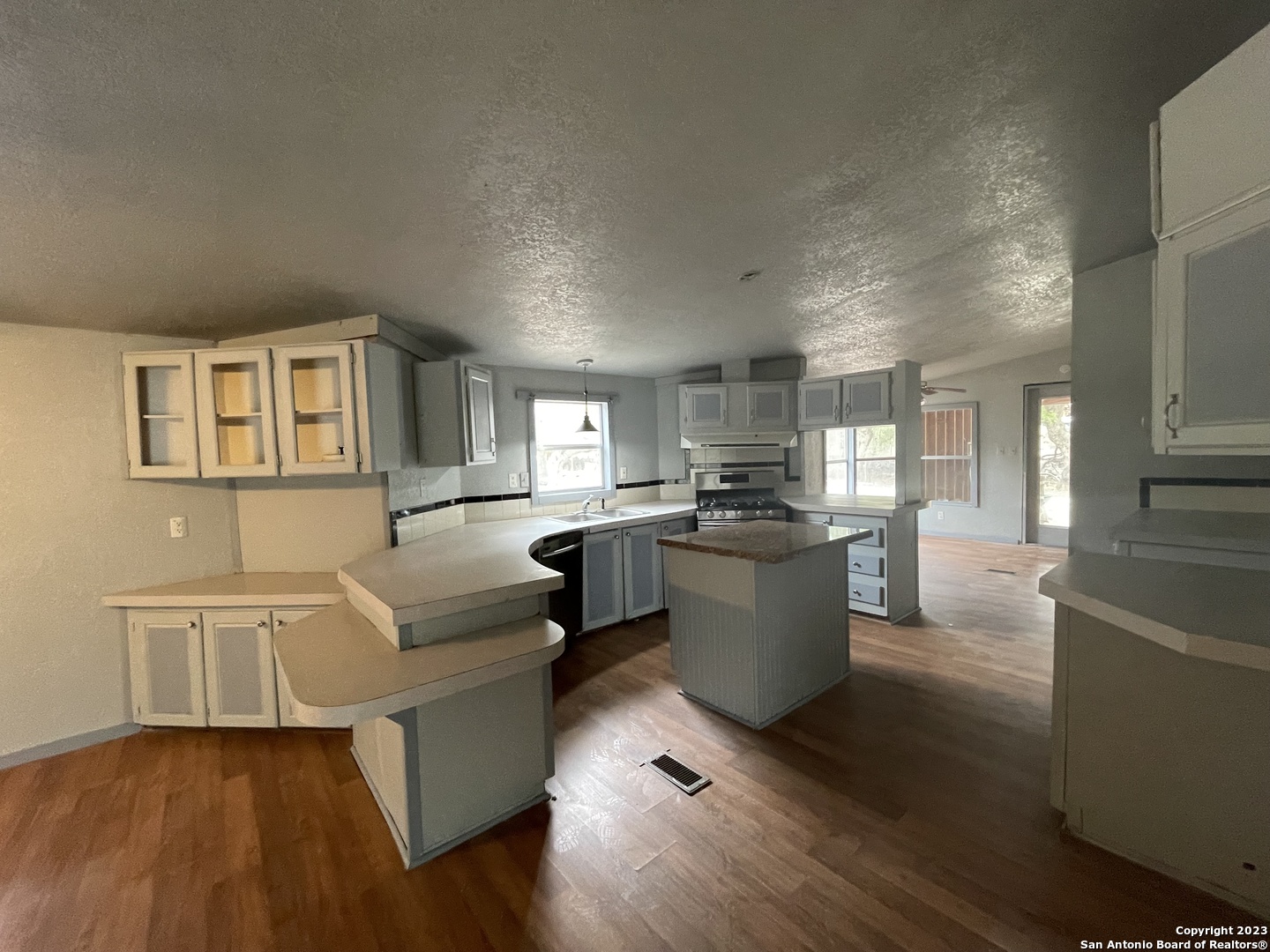 125 Pecan Drive Spring Branch, TX 78070 - Photo 7 of 12 a living room with furniture and kitchen view