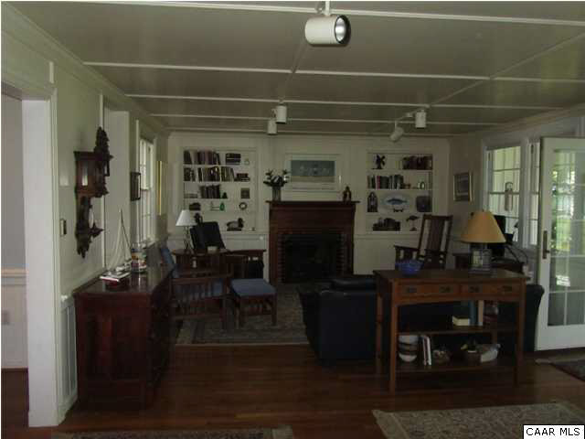 664 Horseshoe Bend Road Deltaville, VA 23043 - Photo 3 of 12 a room with furniture and a chandelier