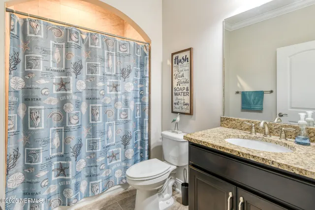 a view of a livingroom with furniture and storage