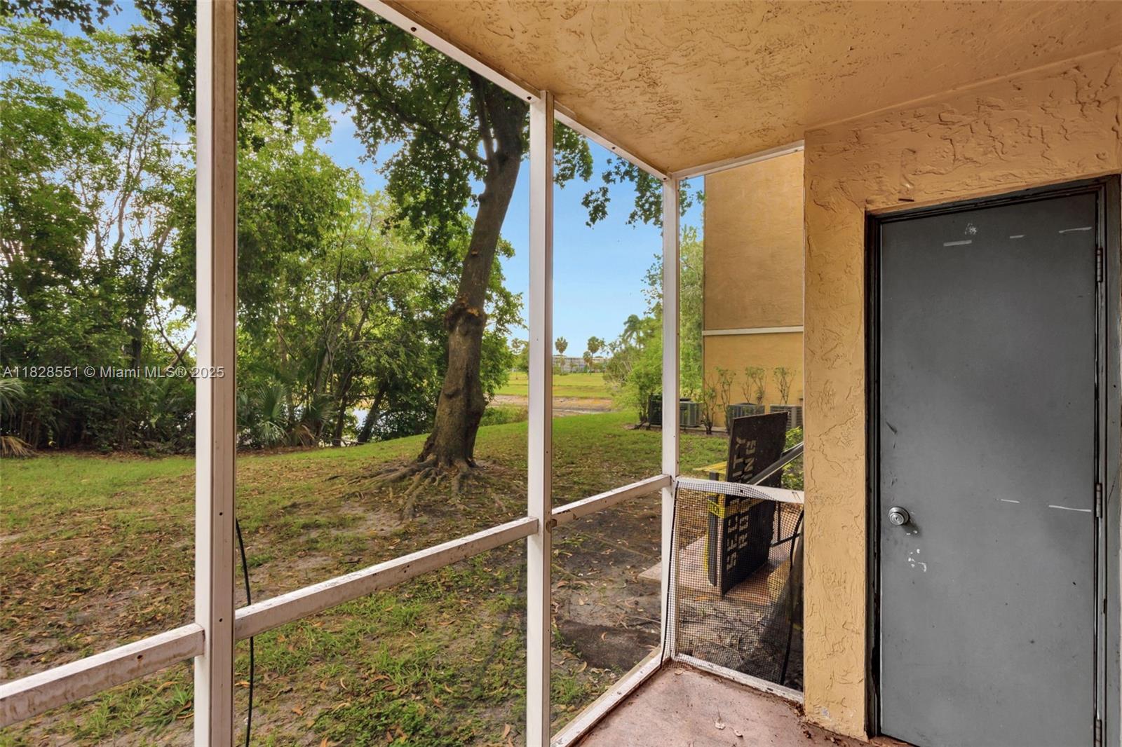 4055 West McNab Road, Unit H103 Pompano Beach, FL 33069 - Photo 16 of 21 a view of a porch