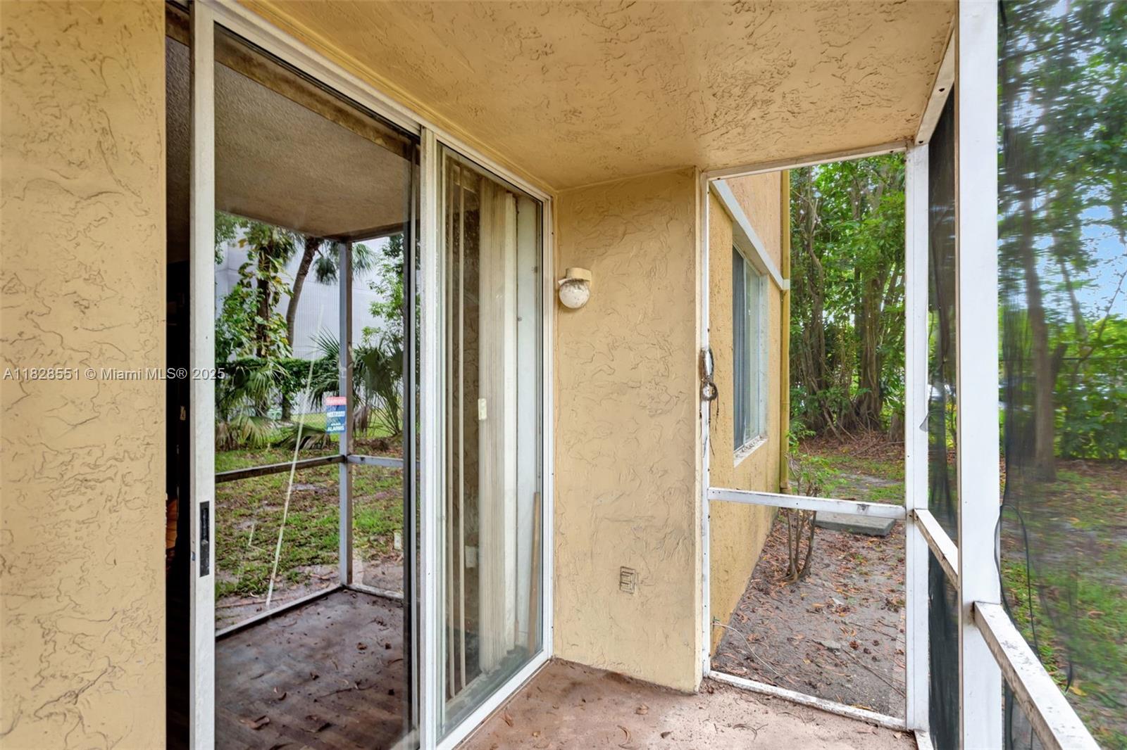 4055 West McNab Road, Unit H103 Pompano Beach, FL 33069 - Photo 18 of 21 a view of a porch