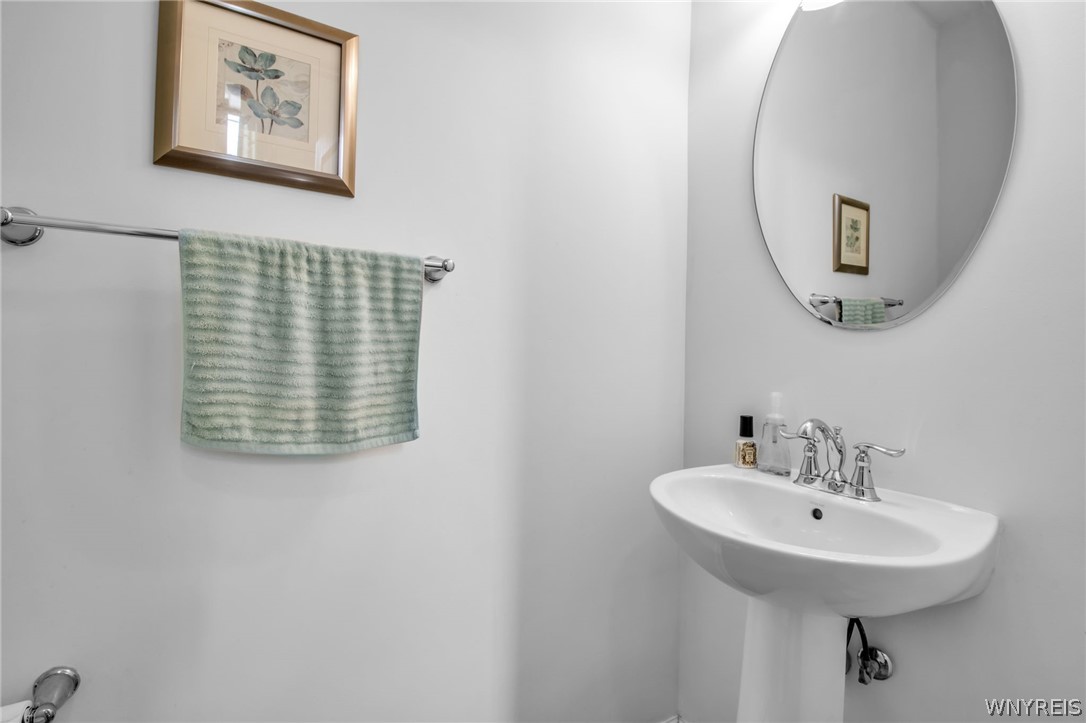 4978 Cloverleaf Lane Pendleton, NY 14094 - Photo 14 of 41 1/2 bath on first floor is convenient for both fam