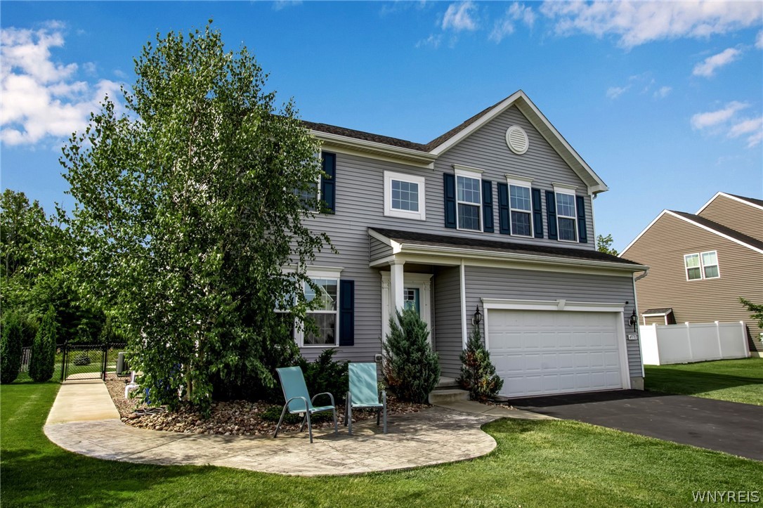 4978 Cloverleaf Lane Pendleton, NY 14094 - Photo 2 of 41 Beautiful seating area in front, and the sidewalk