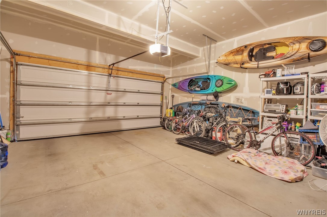 4978 Cloverleaf Lane Pendleton, NY 14094 - Photo 32 of 41 Really nice two-car garage with lots of storage sp