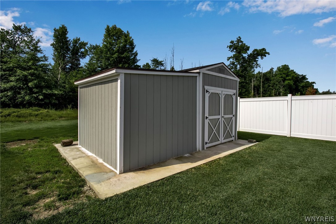 4978 Cloverleaf Lane Pendleton, NY 14094 - Photo 38 of 41 Really nice double shed in backyard for all your s