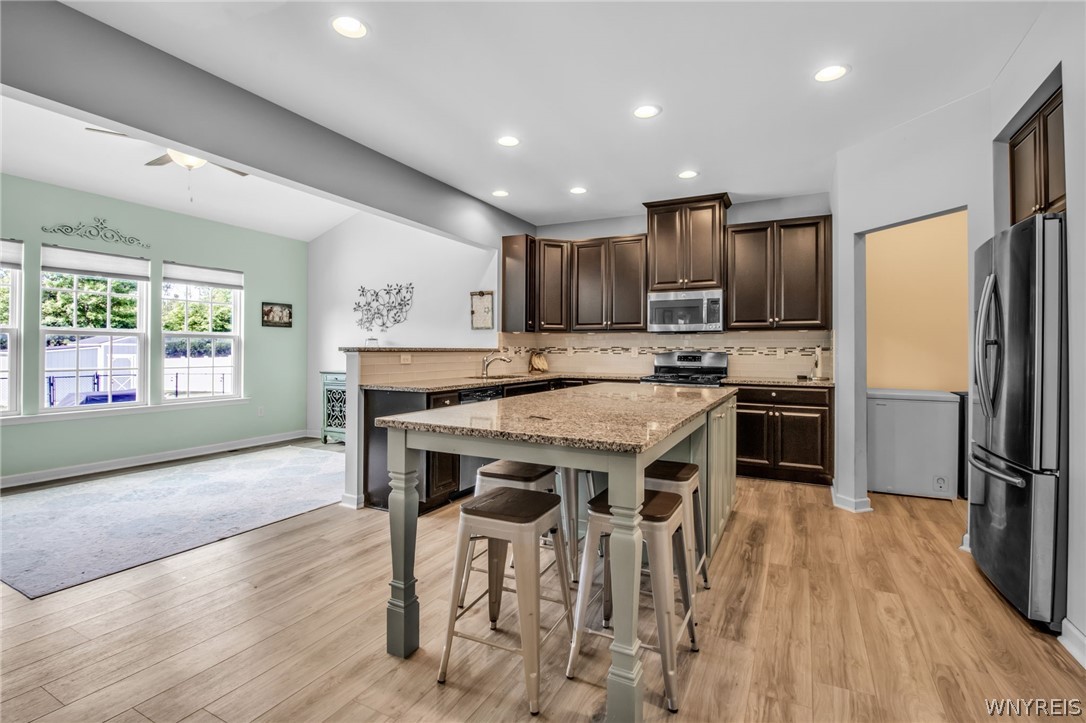 4978 Cloverleaf Lane Pendleton, NY 14094 - Photo 8 of 41 Nice shot of the kitchen and morning room - lots o