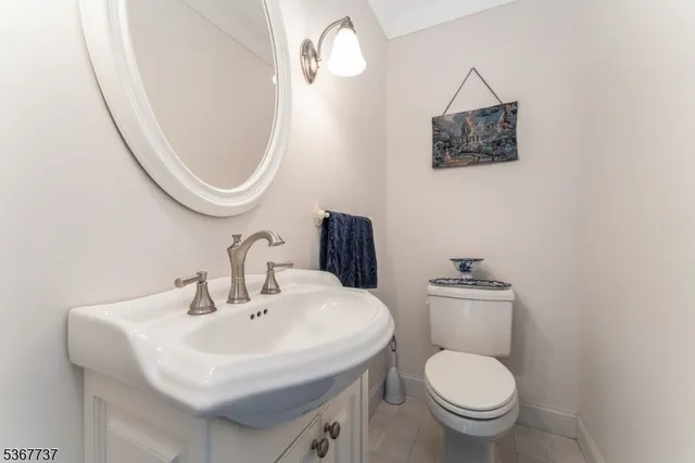 an aerial view of a house with yard swimming pool and outdoor seating