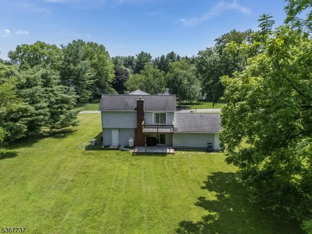 an aerial view of residential house with outdoor space