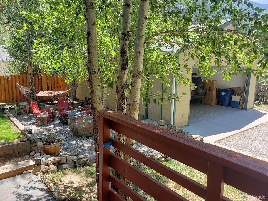 1418 Rose Street Georgetown, CO 80444 - Photo 14 of 33 a view of a bench in a backyard