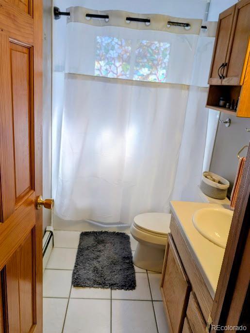 1418 Rose Street Georgetown, CO 80444 - Photo 31 of 33 a bathroom with a sink and toilet