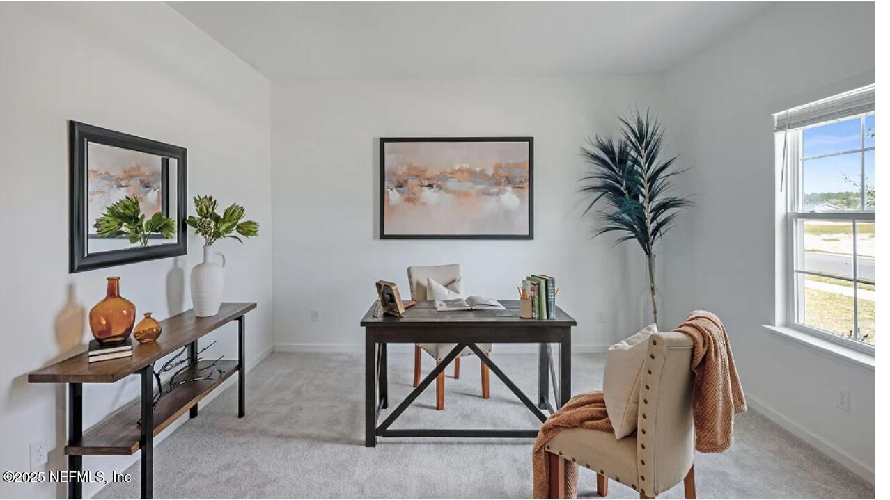 606 Kingbird Drive St. Augustine, FL 32092 - Photo 10 of 14 a workspace with furniture and window