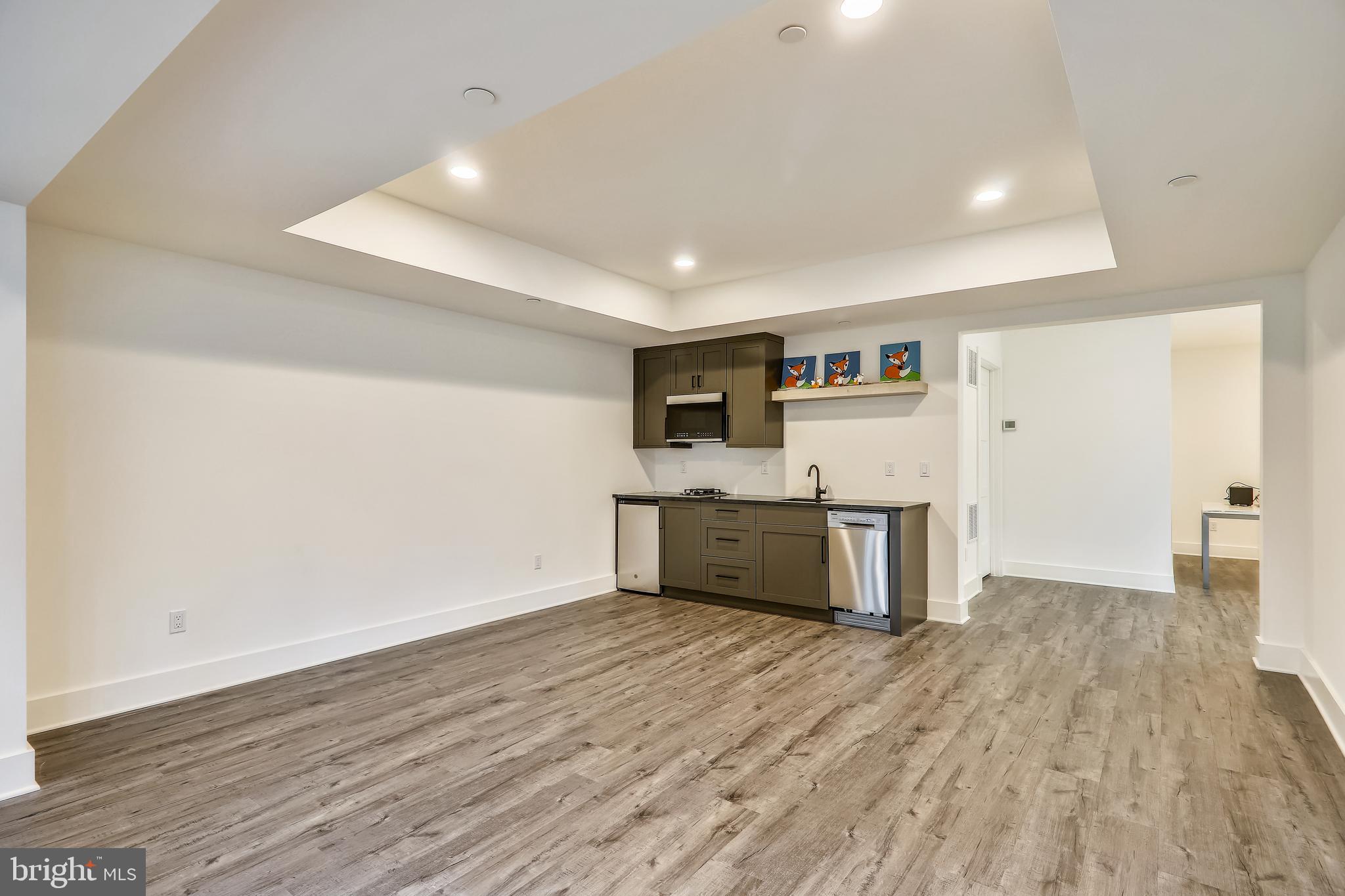 8727 Burning Tree Road Bethesda, MD 20817 - Photo 60 of 85 Lower Level Rec Room with Wet Bar
