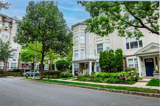 a kitchen with a sink stove top oven and cabinets