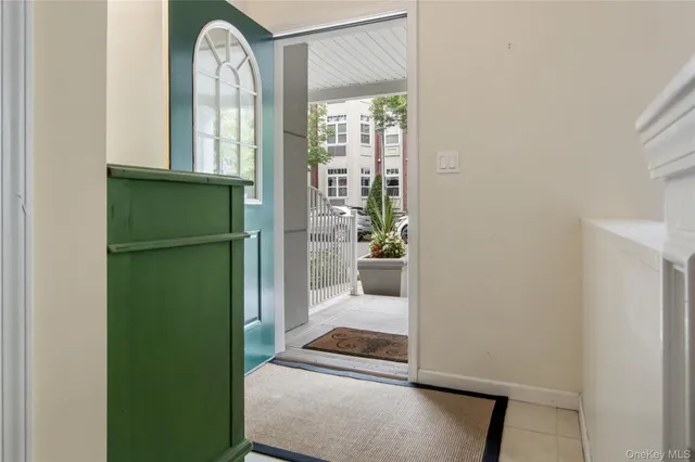 a kitchen with a stove a sink and a refrigerator