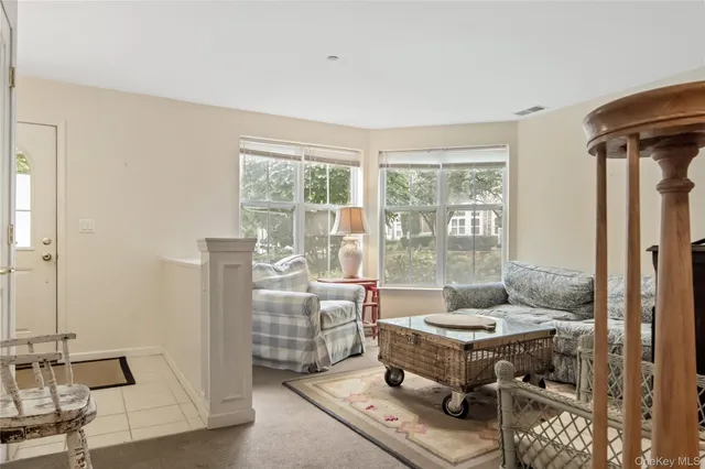 a kitchen with granite countertop a sink and a stove