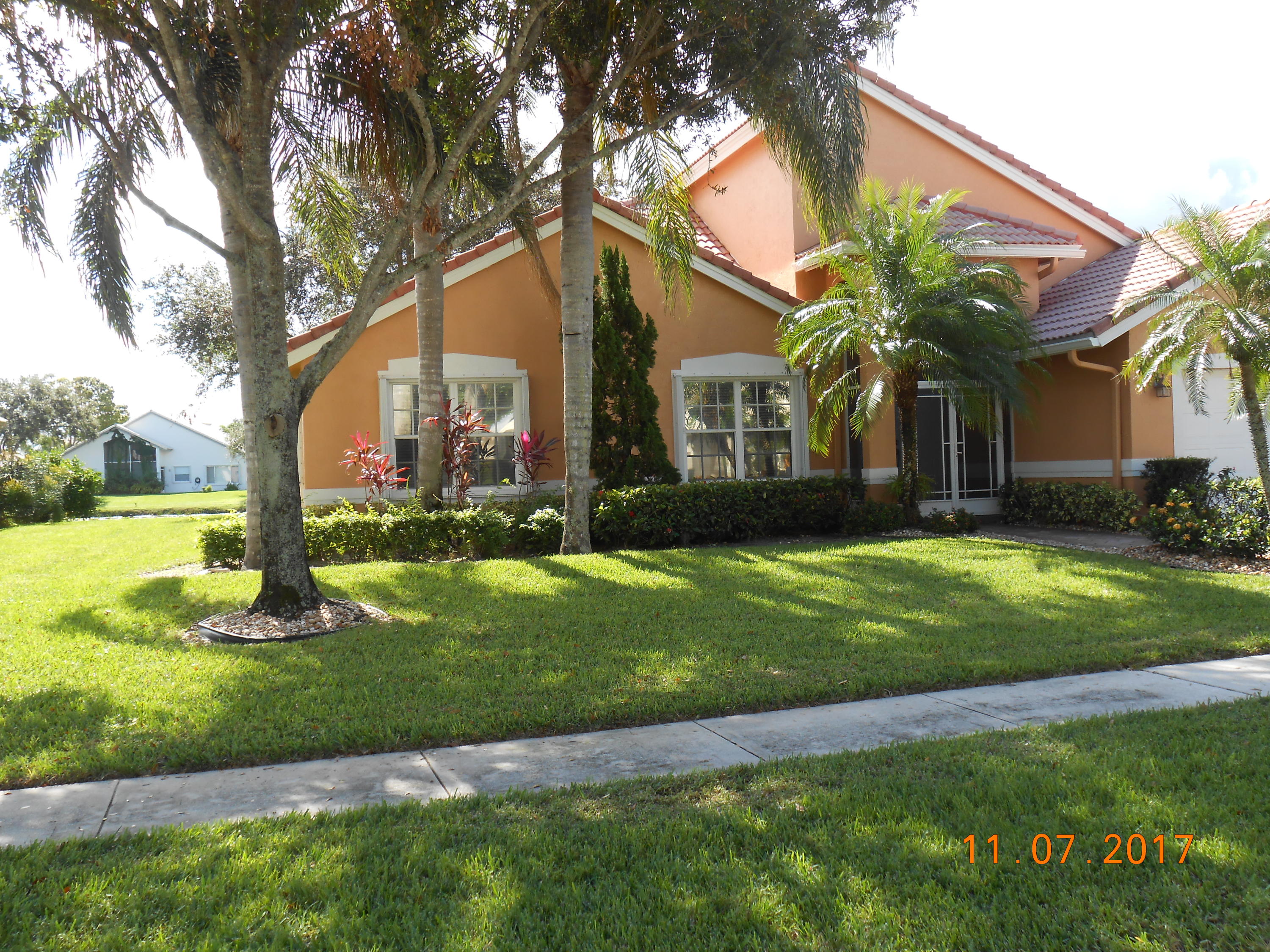 6872 Sun River Road Boynton Beach, FL 33437 - Photo 2 of 26 Front w/view of lake