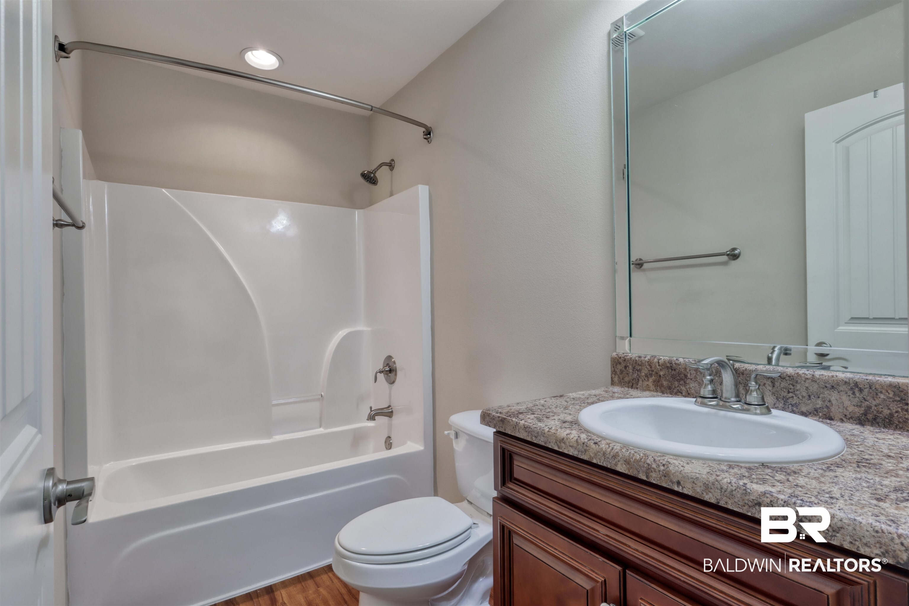 14794 Troon Drive Foley, AL 36535 - Photo 24 of 33 Bathroom with vanity, bathtub / shower combination, and toilet