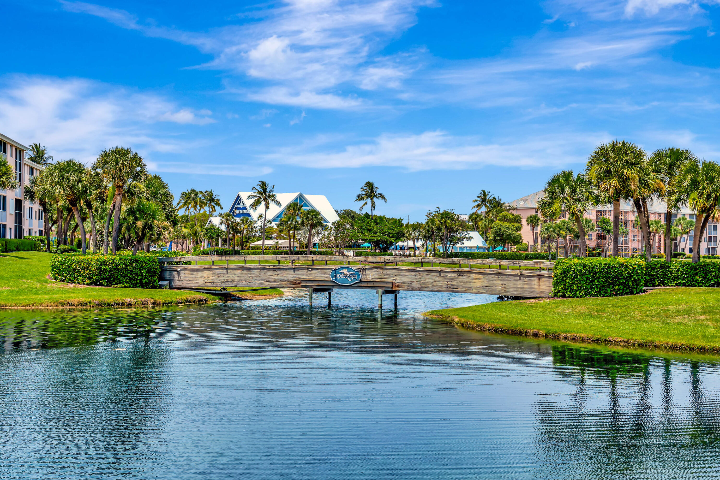 353 Highway 1, Unit A4 Jupiter, FL 33477 - Photo 21 of 51 a view of swimming pool with outdoor seating and plants