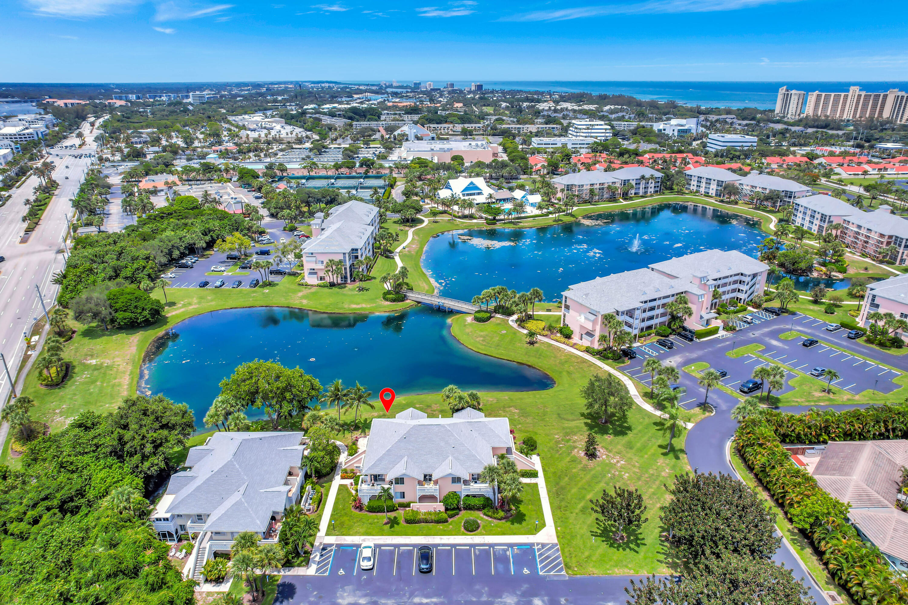 353 Highway 1, Unit A4 Jupiter, FL 33477 - Photo 30 of 51 an aerial view of a house with a swimming pool yard and outdoor seating