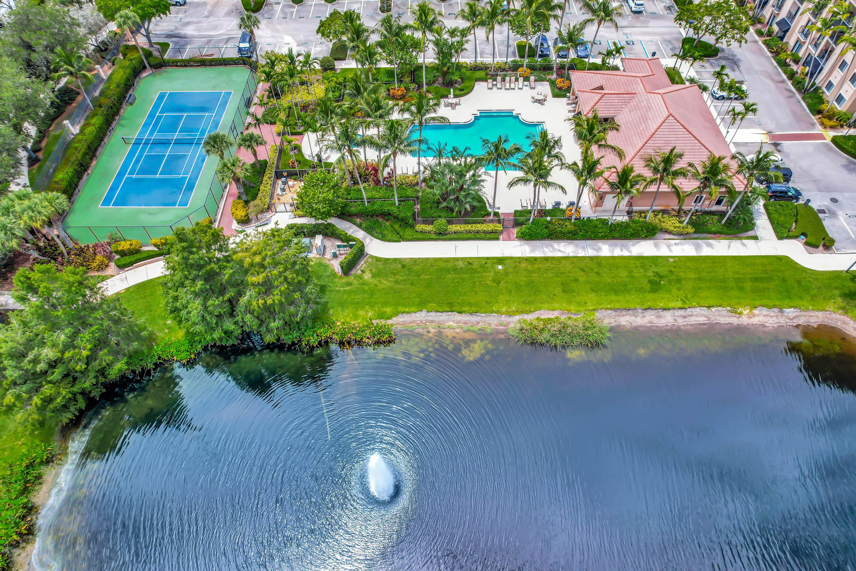 353 Highway 1, Unit A4 Jupiter, FL 33477 - Photo 3 of 51 a view of a house with a yard and lake view