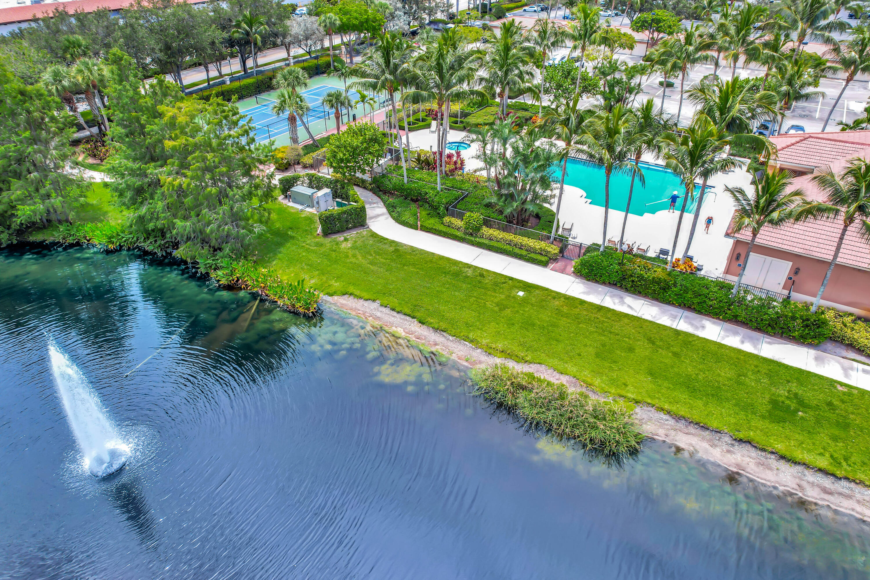 353 Highway 1, Unit A4 Jupiter, FL 33477 - Photo 4 of 51 a view of a lake with a yard