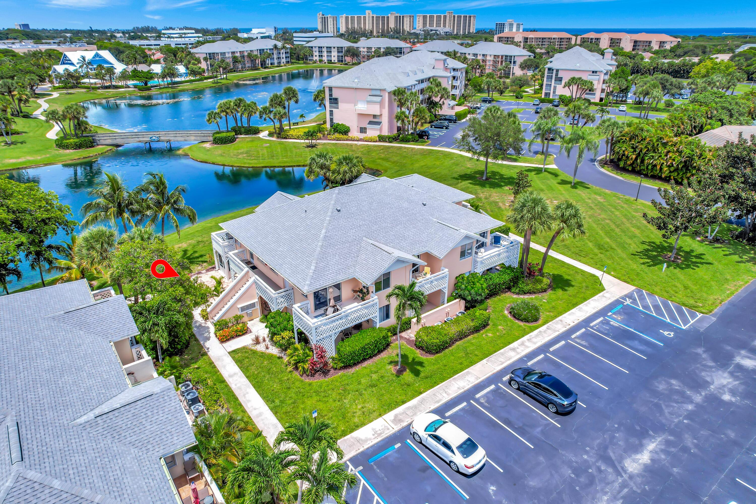 353 Highway 1, Unit A4 Jupiter, FL 33477 - Photo 41 of 51 an aerial view of a house with a garden statue
